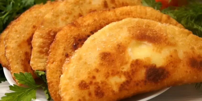 Пирожки "Ругувачки" с творогом и зеленью: настоящая кулинарная находка